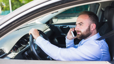 Driver using mobile phone while driving